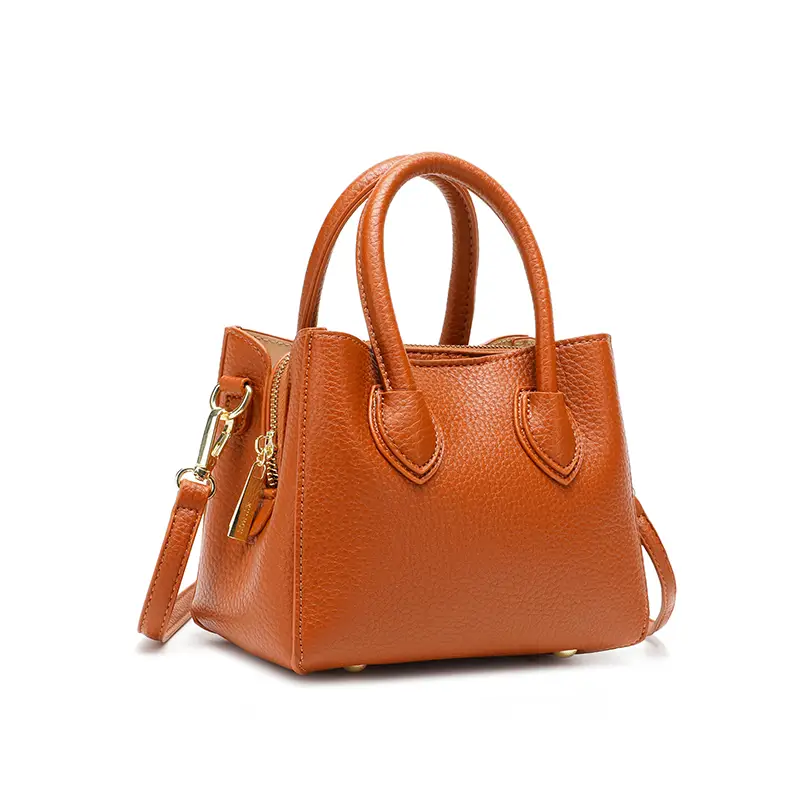 Bolsa Jasmin modelo tote compacta e minimalista